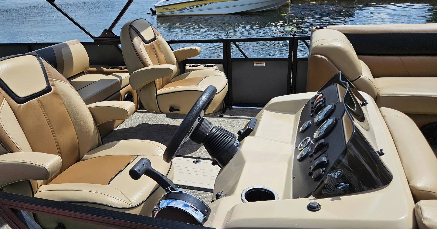 Pontoon helm and captain's chair on the lake