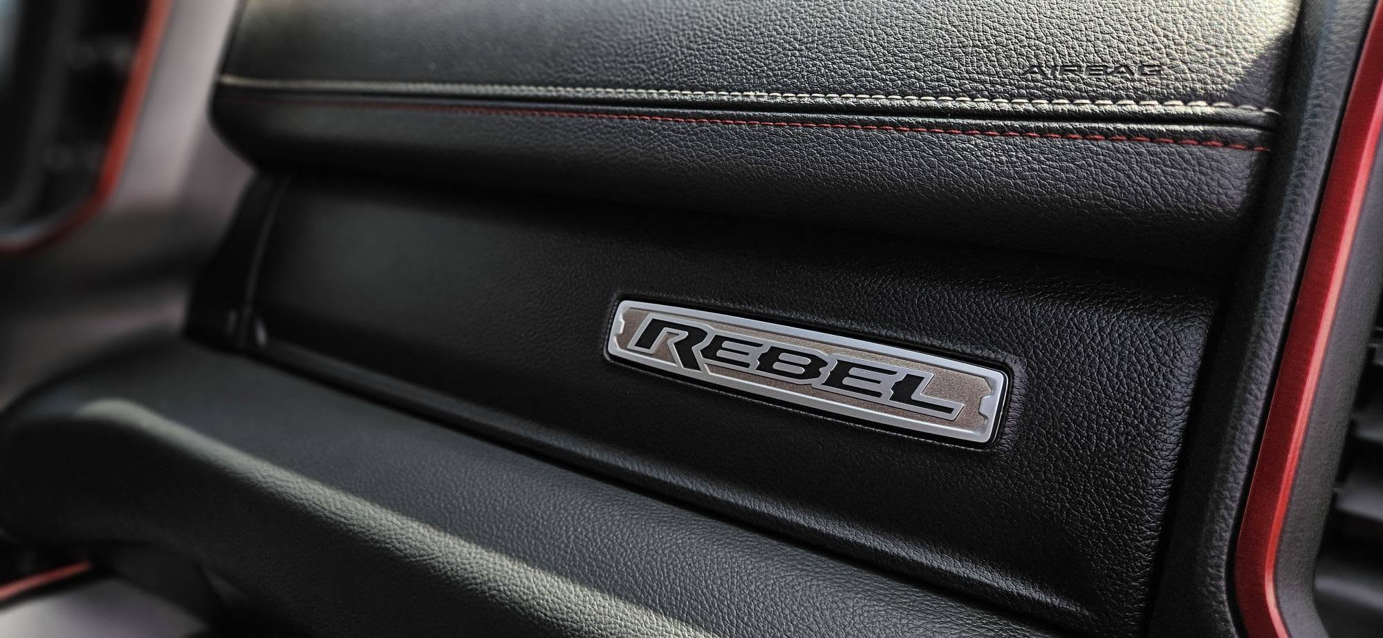 Ram Rebel dashboard leather and red stitching detail