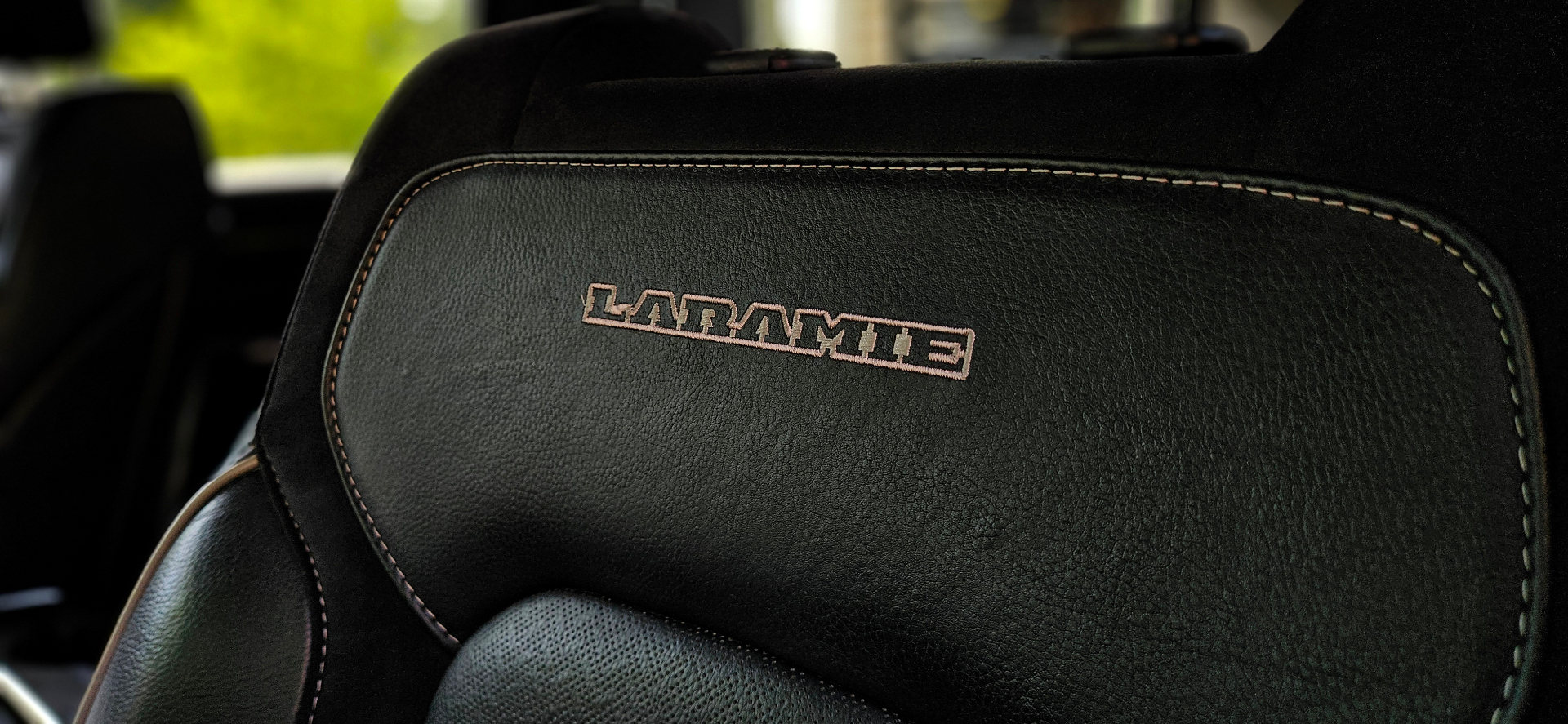 Ram 1500 Laramie embroidered leather headrest detail