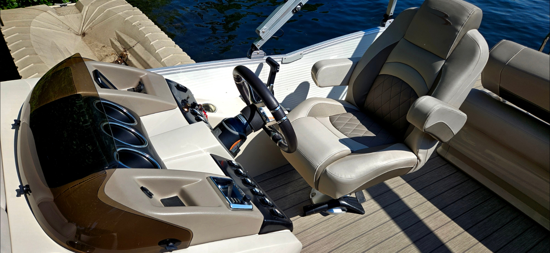 Bennington helm and captain's chair from above on the lake