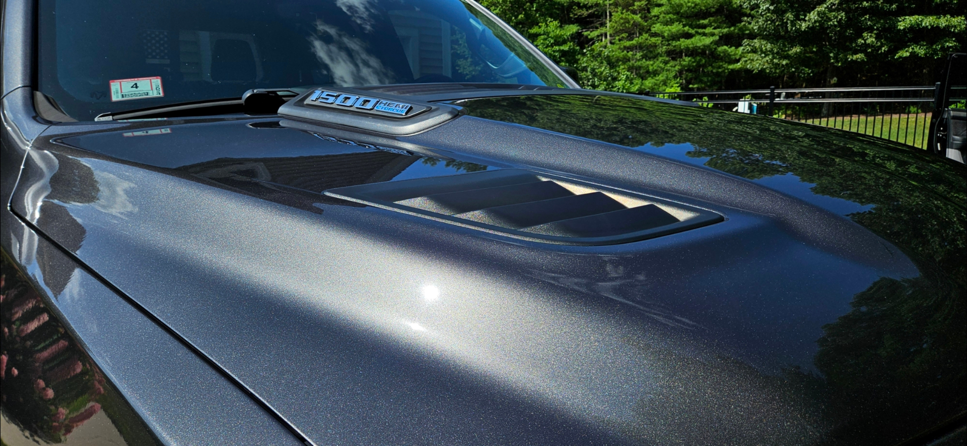 Ram 1500 hood scoop and metallic paint reflection detail