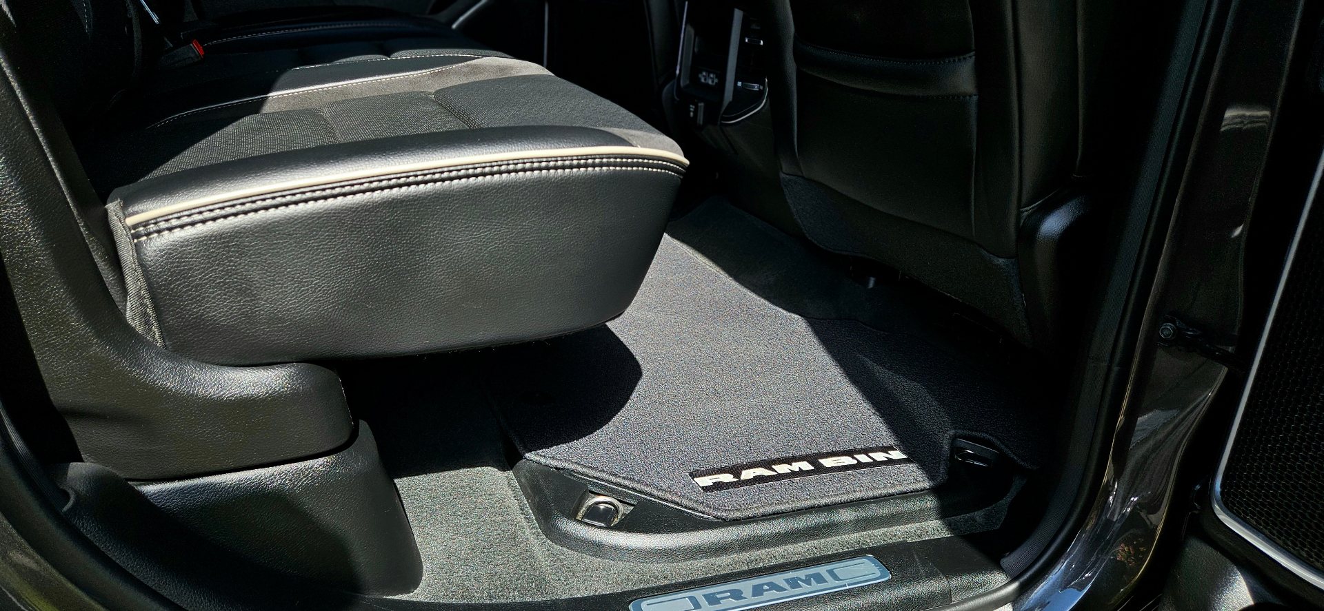 Ram 1500 rear seat floor and cleaned branded floor mat detail