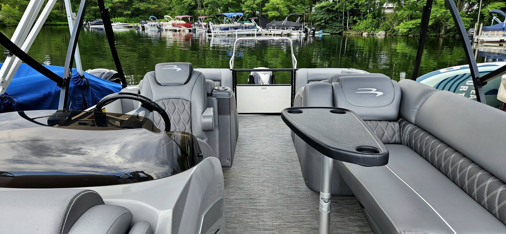Bennington grey helm and seating with wakeboard tower
