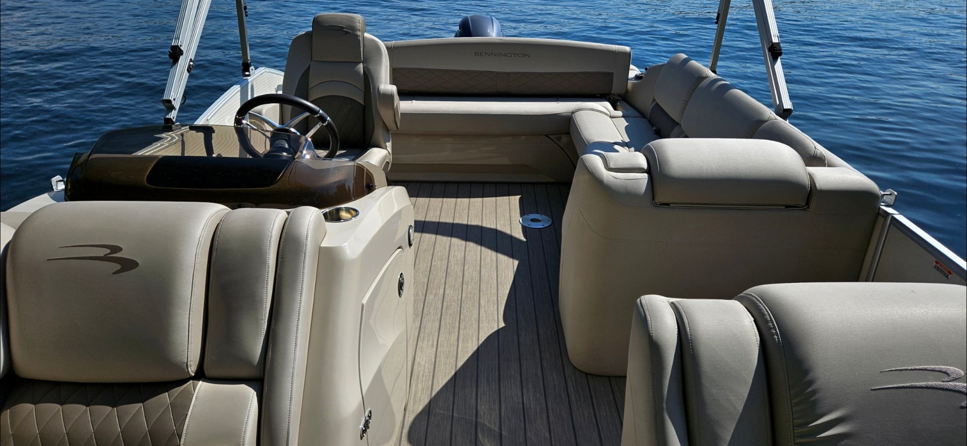 Bennington helm and stern seating with logo detail